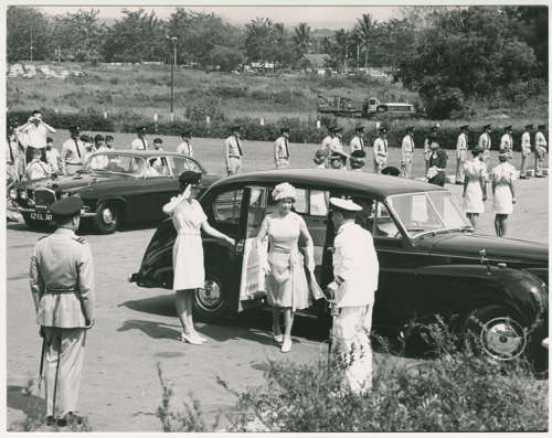 The queen stepping out of a car