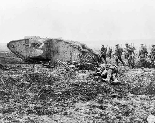 Canadian soldiers advance behind a tank during the assault on Vimy.