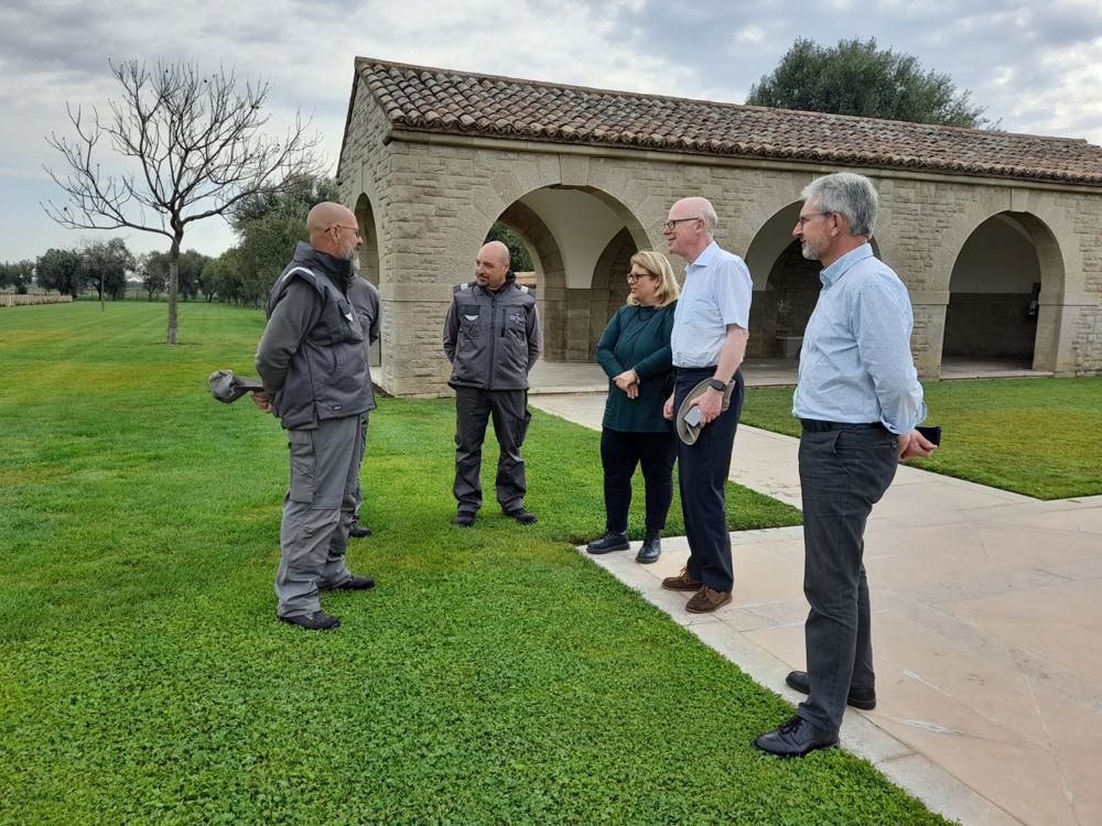 A team discussion at a CWGC cemetery in Italy.